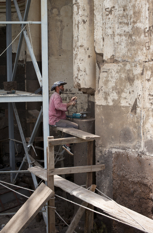 The conservation of the Church of the Holy Savior, sponsored by World Monuments Fund, Arayik Avetyan, a stonemason from Armenia at work, 2024, photographed by Konrad Siekierski.